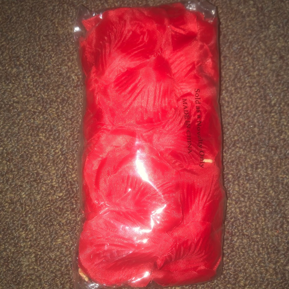 Fake Rose petals. New. Never opened.